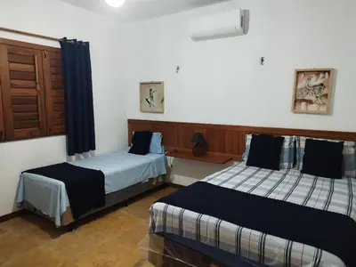Uma cama ou camas num quarto em Repouso do Vento Flecheiras