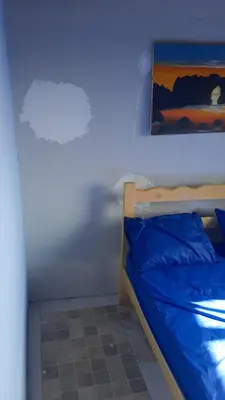Uma cama ou camas num quarto em Hostel Green house beach