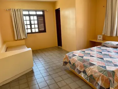 Uma cama ou camas num quarto em Casa de Praia Cascavel