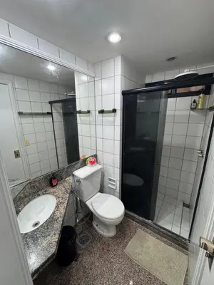 Uma casa de banho em Flat Villa Costeira - Vista Lateral Mar