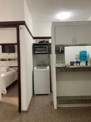 A cozinha ou kitchenette de Flat Villa Costeira - Vista Lateral Mar