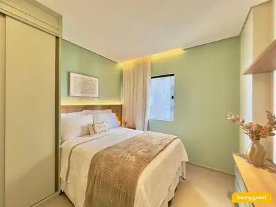 Uma cama ou camas num quarto em Vila Costeira - Beira Mar