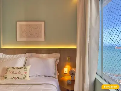 Uma cama ou camas num quarto em Vila Costeira - Beira Mar