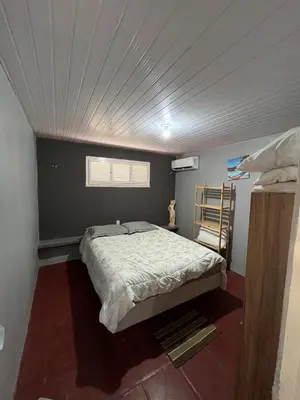 Uma cama ou camas num quarto em Casa Maré Serena Aquiraz