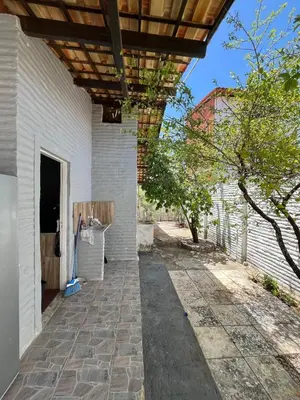 Um jardim no exterior de Casa Maré Serena Aquiraz