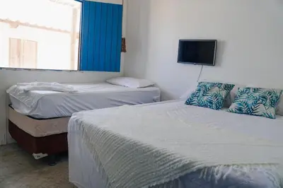 Uma cama ou camas num quarto em Tulum House Ilha do guajiru, Itarema
