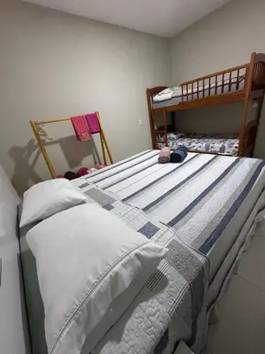 Uma cama ou camas num quarto em Casa Paradise