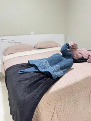 Uma cama ou camas num quarto em Casa Paradise