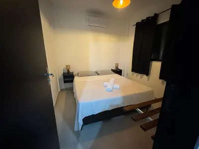 Uma cama ou camas num quarto em Da terra Altos