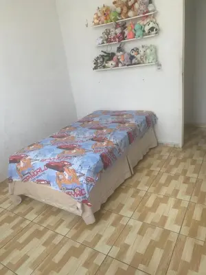 Uma cama ou camas num quarto em 3-bedroom apartment, one of them an en-suite, in Passaré
