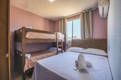Uma cama ou camas num quarto em Mirante #506 - Praia do Futuro por Carpediem