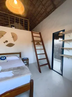 Uma cama ou camas num quarto em Chez Tata - Icaraí Kite Village