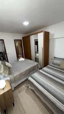 Uma cama ou camas num quarto em Beach Place ACONCHEGO e refúgio perto do mar