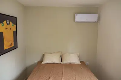 Uma cama ou camas num quarto em Pousada Flor do Sol