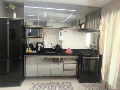 A cozinha ou kitchenette de Apto 2 quartos luxuoso a poucos metros da Beira Mar