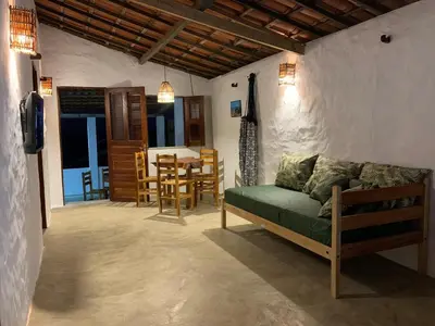 Uma área de estar em Casa Mar Redonda - Icapuí