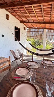Uma área de estar em Casa Mar Redonda - Icapuí