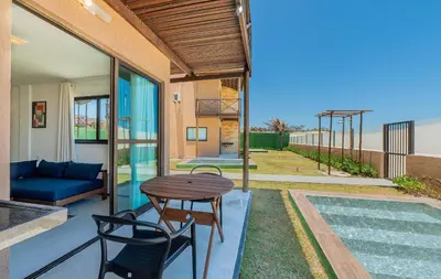 A piscina em ou perto de Beachfront Duplex Pé na Areia By Carpediem