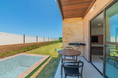 A piscina em ou perto de Beachfront Duplex Pé na Areia By Carpediem