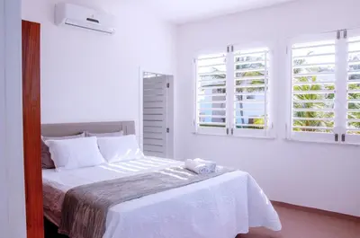 Uma cama ou camas num quarto em Soulkite House Brazil