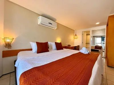 Uma cama ou camas num quarto em O melhor da Beira Mar de Fortaleza