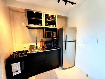 A cozinha ou kitchenette de Hosts BR - Apartamentos Econômicos na Praia do Futuro