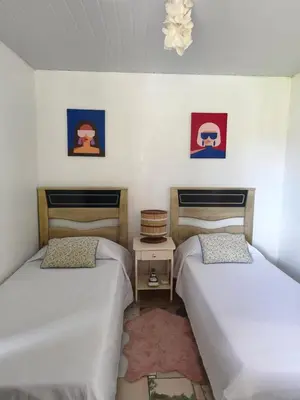 Uma cama ou camas num quarto em Summer House