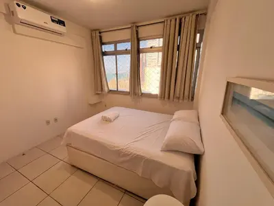 Uma cama ou camas num quarto em Apto 2 quartos na Beira Mar