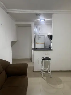 A cozinha ou kitchenette de Apartamento totalmente mobiliado