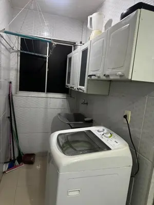 A cozinha ou kitchenette de Apartamento totalmente mobiliado