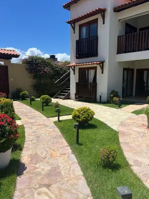 Um jardim no exterior de Residência Vittoria
