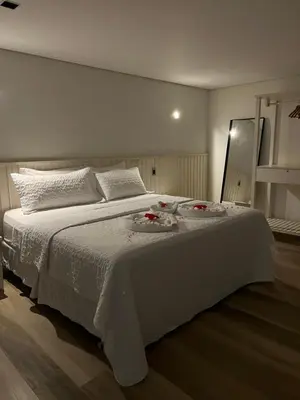 Uma cama ou camas num quarto em Residência Vittoria