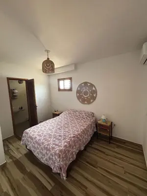 Uma cama ou camas num quarto em Cozy Condo Preá Beira-mar