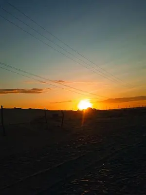 O nascer ou o pôr do sol visto a partir do apartamento