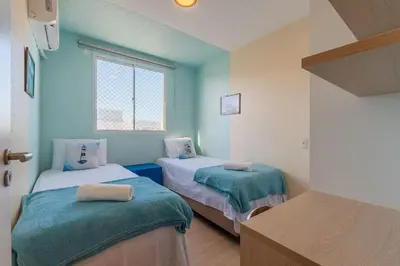 Uma cama ou camas num quarto em Mirante #1401 - Apartamento completo by Carpediem