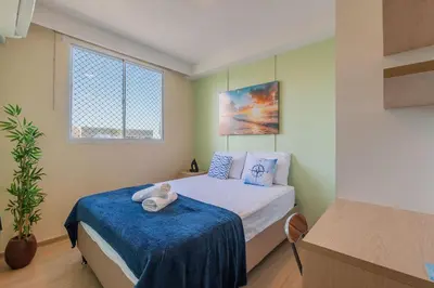 Uma cama ou camas num quarto em Mirante #1401 - Apartamento completo by Carpediem