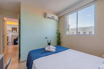 Uma cama ou camas num quarto em Mirante #1401 - Apartamento completo by Carpediem