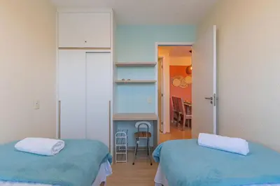 Uma cama ou camas num quarto em Mirante #1401 - Apartamento completo by Carpediem