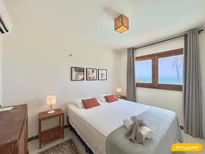 Uma cama ou camas num quarto em Beach-Home Pontal de Maceió