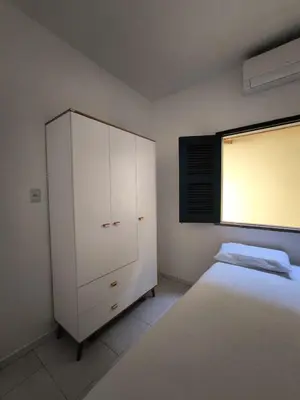 Uma cama ou camas num quarto em Casa Mahalo - no centro de Cumbuco