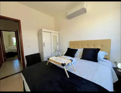Uma cama ou camas num quarto em Canoa quebrada - Apartamento a 4 minutos da Praia