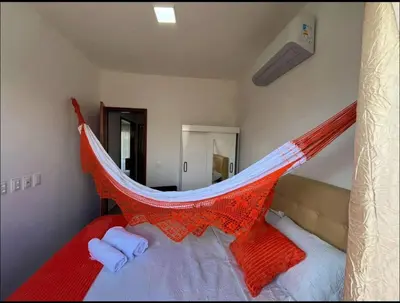 Uma cama ou camas num quarto em Canoa quebrada - Apartamento a 4 minutos da Praia