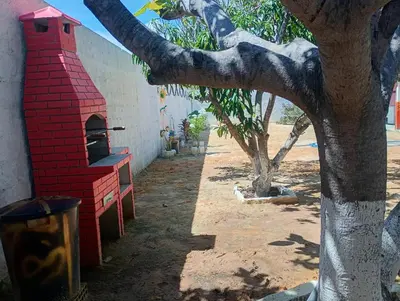 Um jardim no exterior de Hostel Mamitchesca