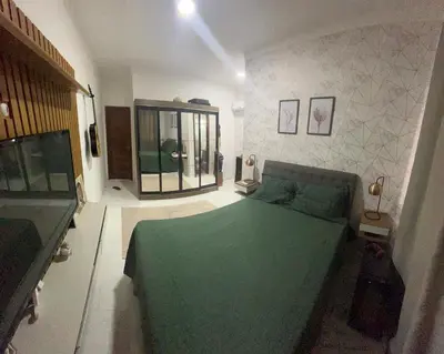 Uma cama ou camas num quarto em Casa Cristã familiar
