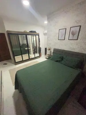 Uma cama ou camas num quarto em Casa Cristã familiar