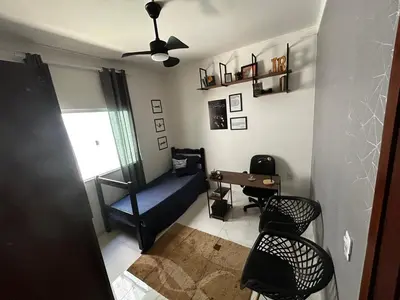 Uma área de estar em Casa Cristã familiar
