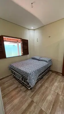 Uma cama ou camas num quarto em Encanto de paracuru