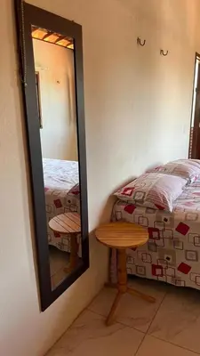 Uma cama ou camas num quarto em Encanto de paracuru