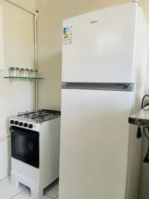 A cozinha ou kitchenette de Apartamento próximo ao Aeroporto Internancional P Martins