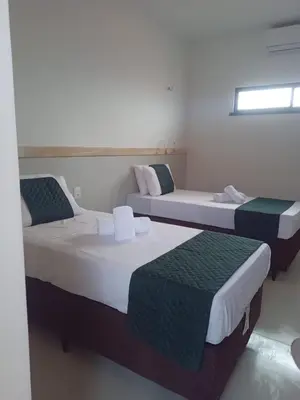 Uma cama ou camas num quarto em São João Paulo II - Casa de Retiro